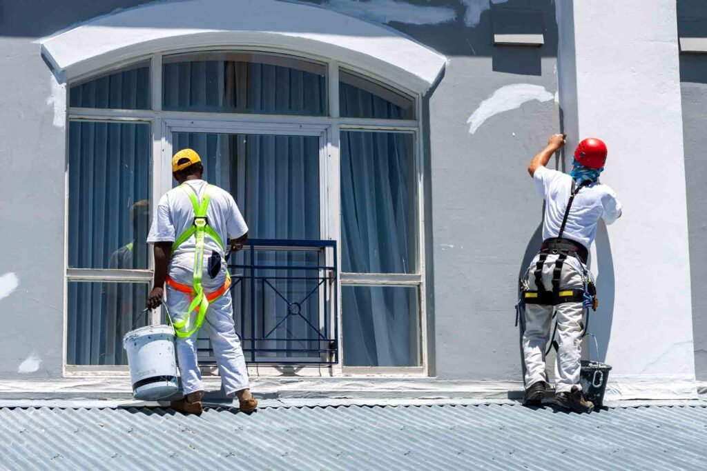 homeguide commercial painters working on building exterior